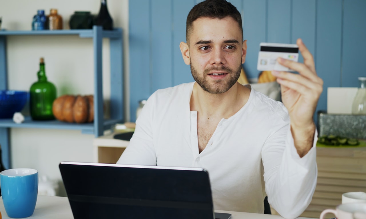 Person comparing BNPL and credit card payment options on smartphone